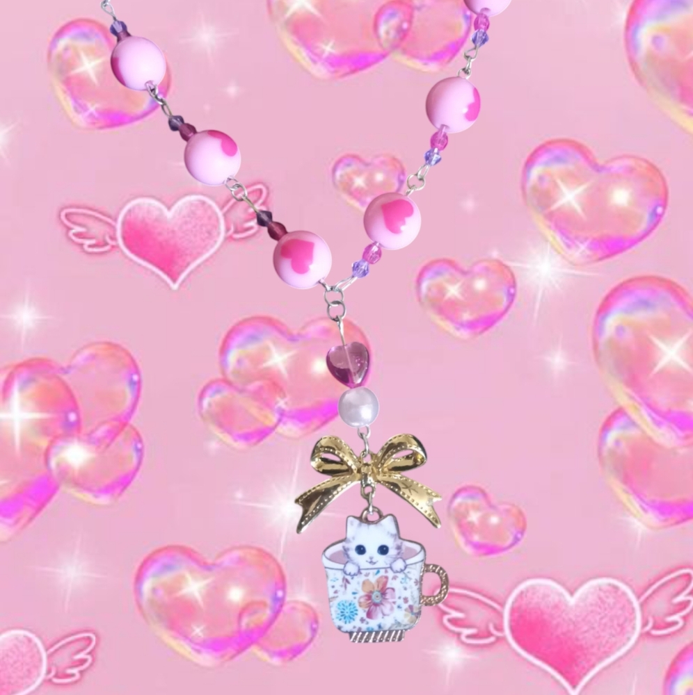 Pink and Gold Beaded Necklace with Bow Charm